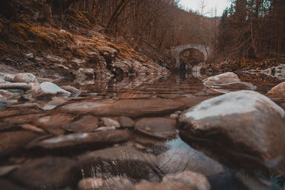 Surface level of stream flowing through rocks