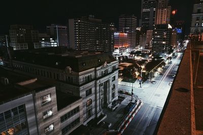 High angle view of illuminated cityscape at night