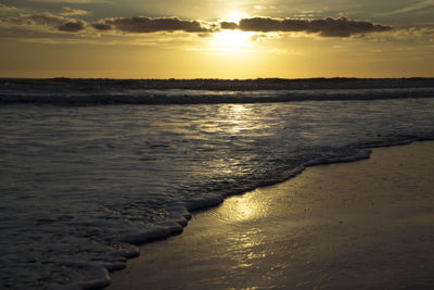 Scenic view of sea at sunset