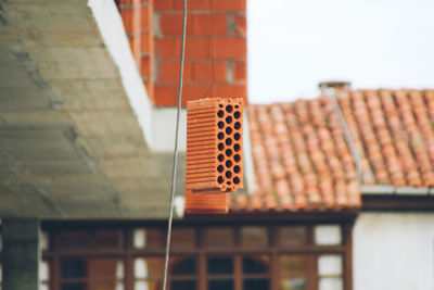 Bricks hanging on a construction site