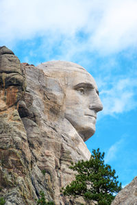 Low angle view of mt rushmore national monument against sky