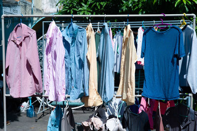 Clothes drying on rack