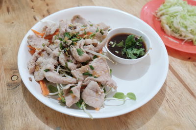 Meat skin appetizer served with soya dip