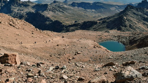 A high altitude fresh water lake above the clouds at mount kenya, mount kenya national park, kenya