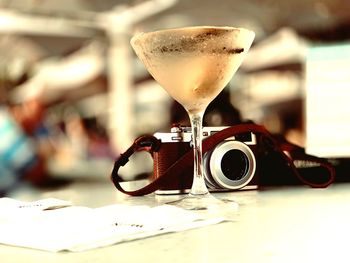 Close-up of beer glass on table