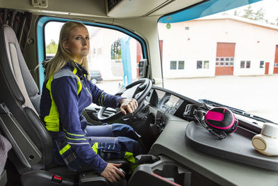 Young female truck driver