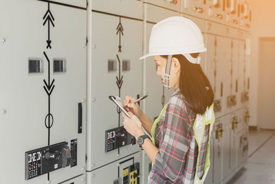 Woman holding mobile phone