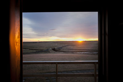 Scenic view of sea at sunset