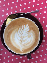 Directly above shot of cappuccino on table