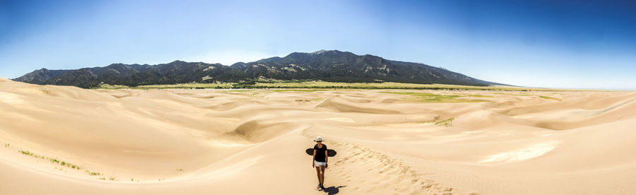 Woman at desert on sunny day