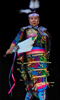 Full length of man standing against black background