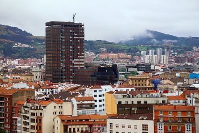 High angle view of residential district against sky