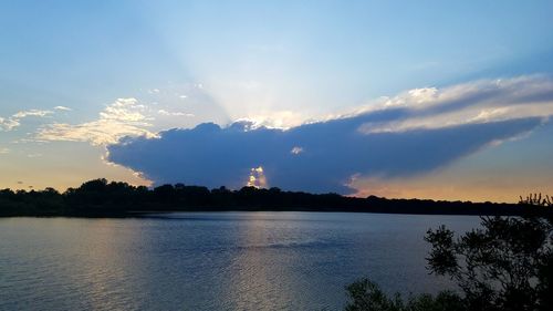 Scenic view of silhouette trees against sky during sunset