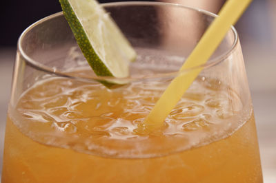 Close-up of orange juice in glass