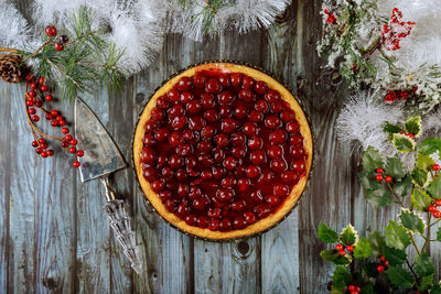 Directly above shot of red berries in bowl