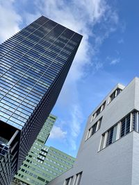 Low angle view of modern buildings against sky