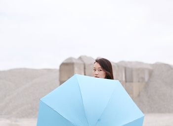 Close-up of woman standing in pond