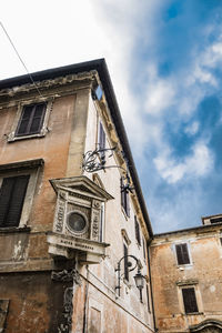 Low angle view of old building against sky