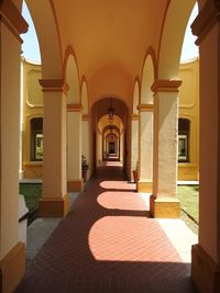 Sunlight falling in colonnade of building