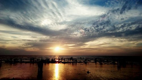 Scenic view of sea at sunset