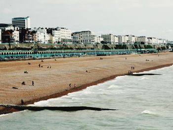 View of sea with buildings in background