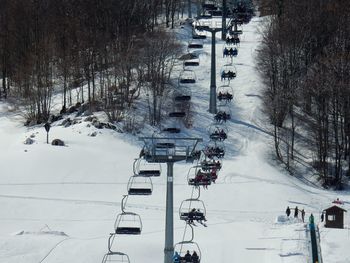 High angle view of snow covered road in city