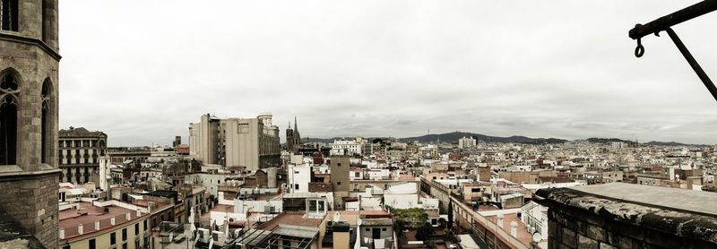 High angle view of buildings in city against sky