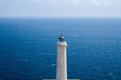 Scenic view of sea against blue sky