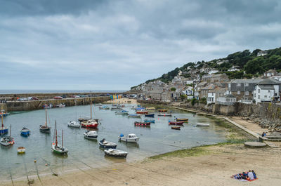 High angle view of boats moored at harbor