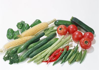 Close-up of bell peppers against white background