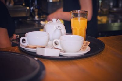 Close-up of drinks served on table in cafe