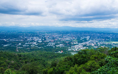 High angle view of buildings in city against sky