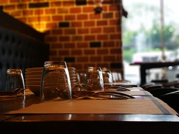 Close-up of wine glass on table at cafe