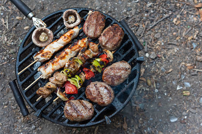 High angle view of food on barbecue grill