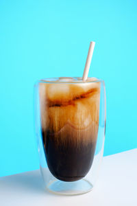 Close-up of drink against white background