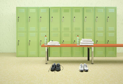 View of empty bench locker room