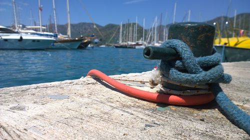 Rope tied on cleat at harbor