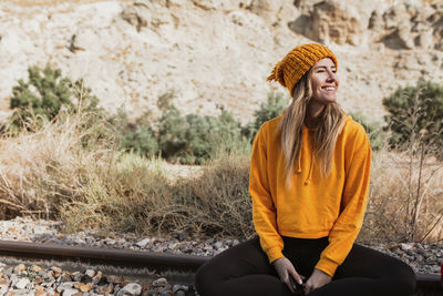 Woman sitting in park