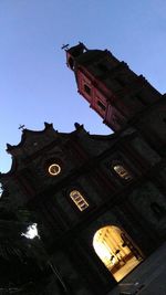 Low angle view of church against sky