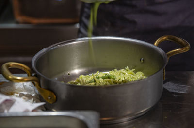 Close-up of noodles in bowl on table at home