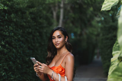 Young woman using mobile phone