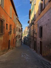 Narrow alley along buildings