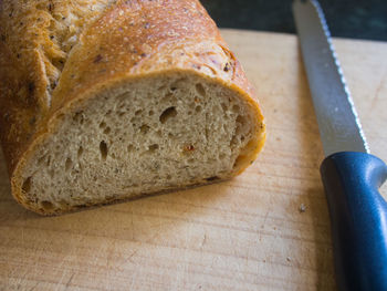 Bread on cutting board in kitchen at home