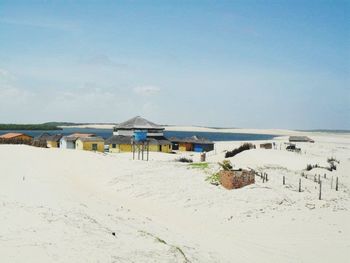 View of beach against blue sky