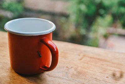 Close-up of tea cup on table