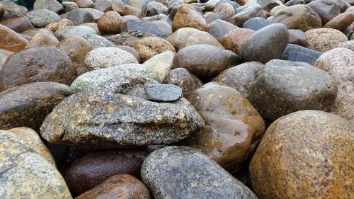 Full frame shot of pebbles at beach