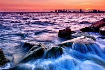 Scenic view of sea against sky during sunset