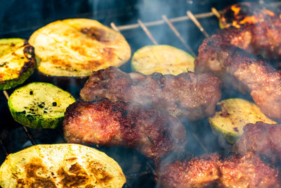 Close-up of meat on barbecue grill