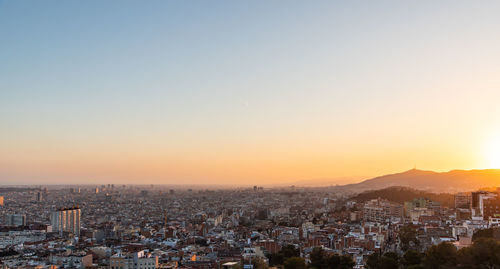 High angle view of townscape against sky during sunset