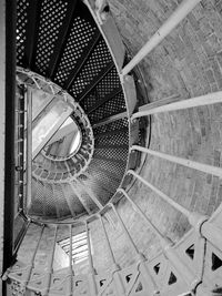 Directly below shot of spiral staircase in building